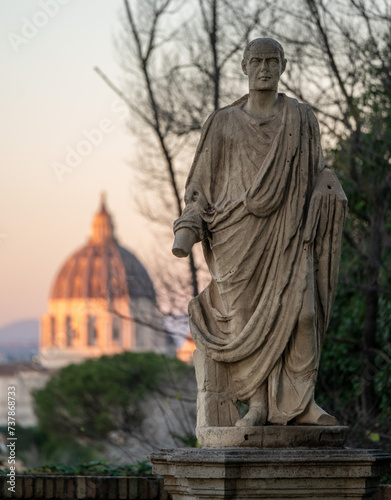 Old statue and dome of saint peter