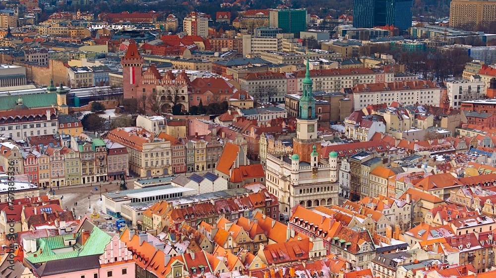 Aerial view of Poznań's historic market square in winter.