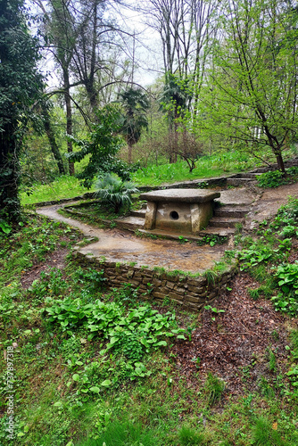 Decorative dolmen in Sochi arboretum. megalithic structure for the funeral ritual. photo