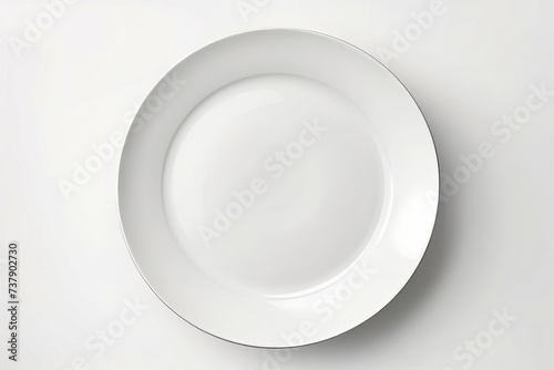 White plate with white rim on white surface.
