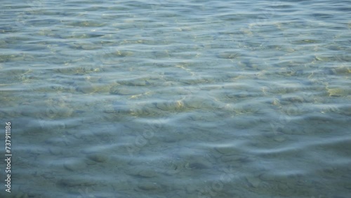  Perpetual undulating ripples of alluring crystal clear freshwater lake 