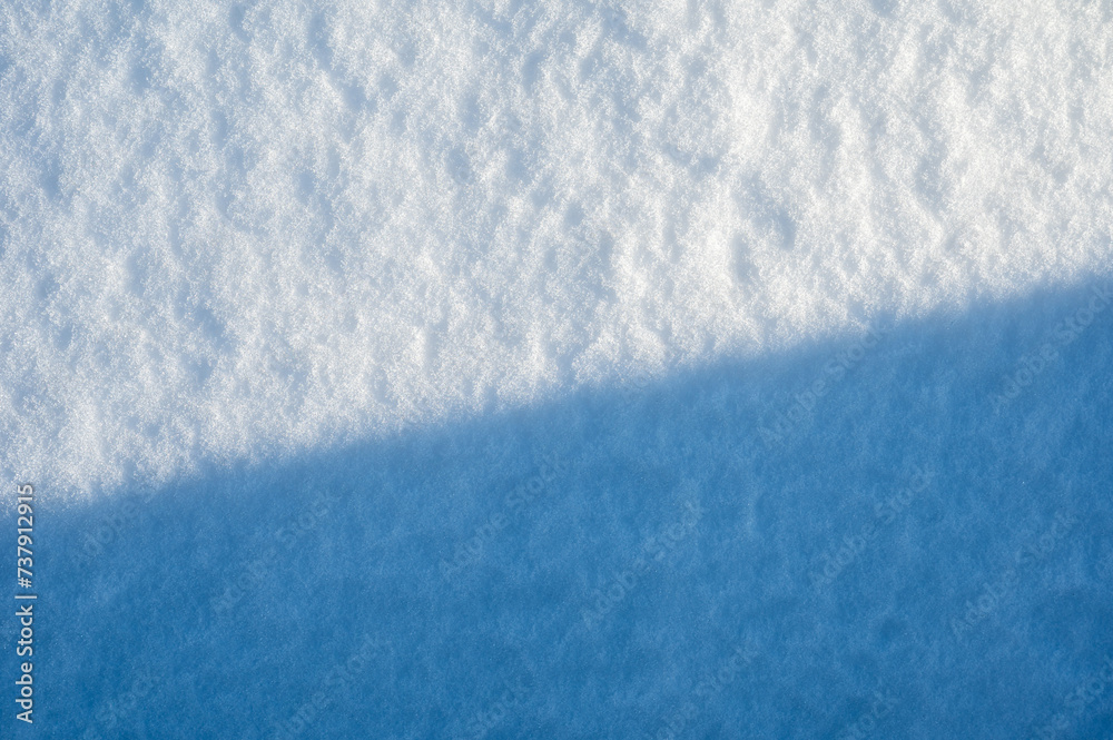 Obraz premium Abstract overhead view of snow with a diagonal separating the shadows, Brussels, Belgium