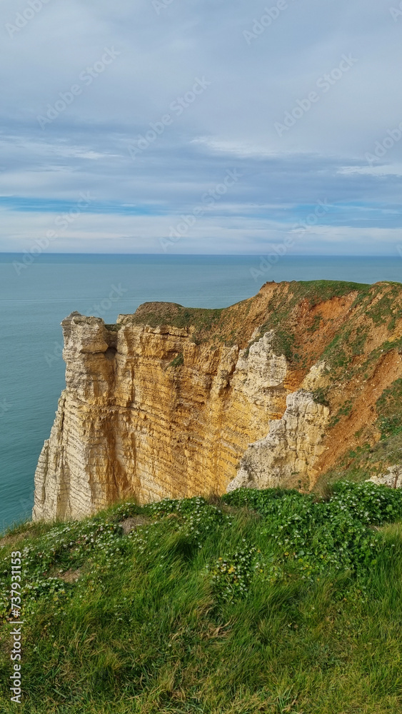 Spectacular natural cliffs Aval of Etretat and beautiful famous coastline, Normandy, France