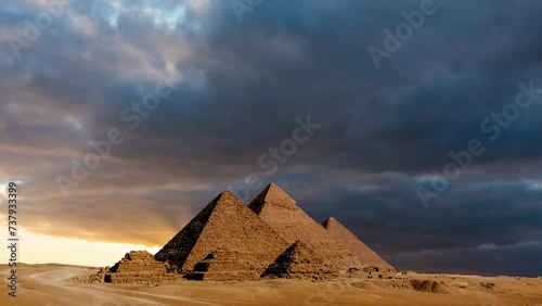 Timelapse of sunset at Pyramid complex of Giza, in Cairo, Egypt. photo