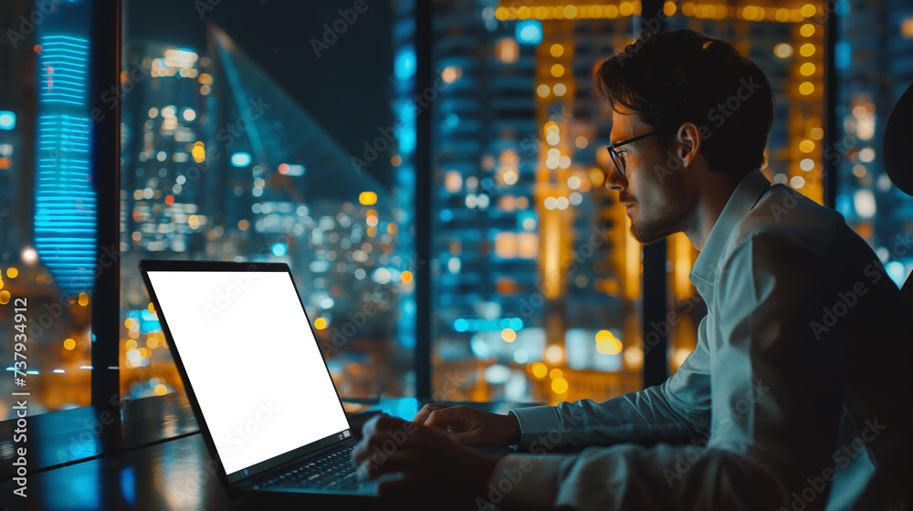 Focused Man Working on Laptop Mockup Against City Night Lights Focused Man Working on Laptop Mockup Against City Night Lights