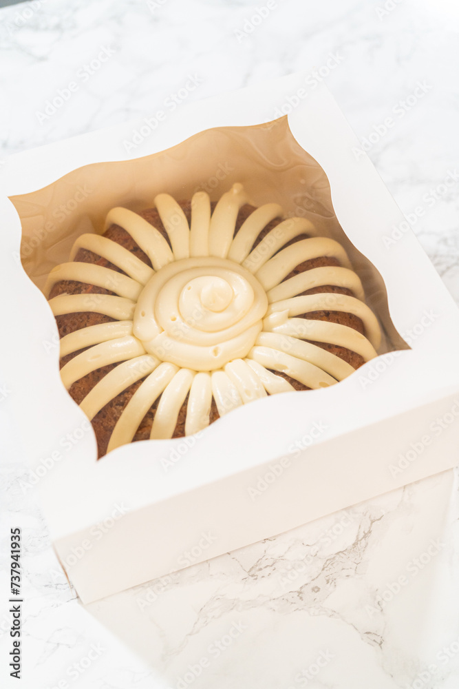 Obraz premium Sweet Treat: Carrot Bundt Cake in Paper Box