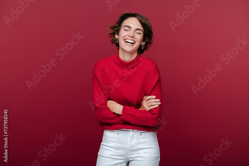 Closeup portrait of beautiful young woman with happy face, with white teeth laughing