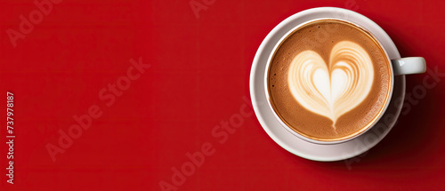 White coffee cup with heart latte art and aromatic cappuccino on red background with empty space for text created with Generative AI Technology photo