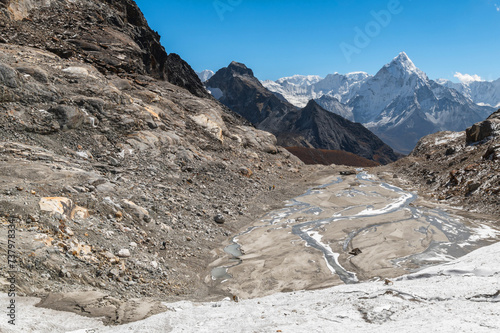 Mounts Baruntse, Chamlang and Ama Dablam from Cho La Pass during Everest Base Camp EBC or Three Passes trekking in Khumjung, Nepal. Highest mountains in the world. Snowy alpine landscape