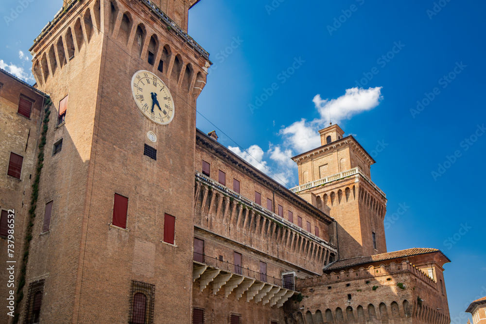 Ferrara, Emilia Romagna, Italy. The imposing Estense castle, built by the noble Este family, with its towers and moat full of water. UNESCO World Heritage Site.