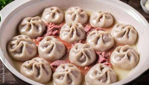 Russian traditional pelmeni with meat. Uncooked freshly made raw