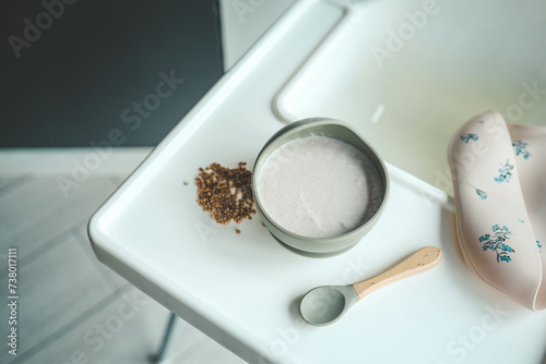 Obraz na płótnie Buckwheat porridge for children in a plate