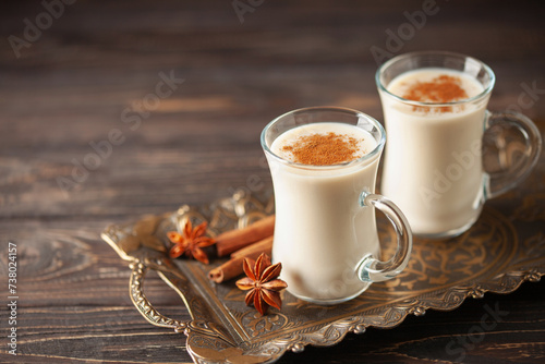 Turkish traditional hot drink salep on wooden background. Copy space photo