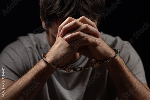 Εκτύπωση καμβά Handcuffed man covering his face with his hands