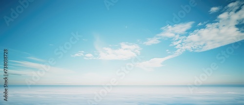 Serene Blue Sky and Fluffy Clouds Panorama © evening_tao
