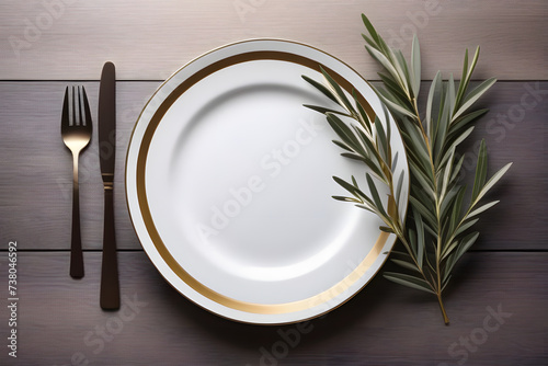 Elegant White Plate With Gold Trim and Fork and Knife