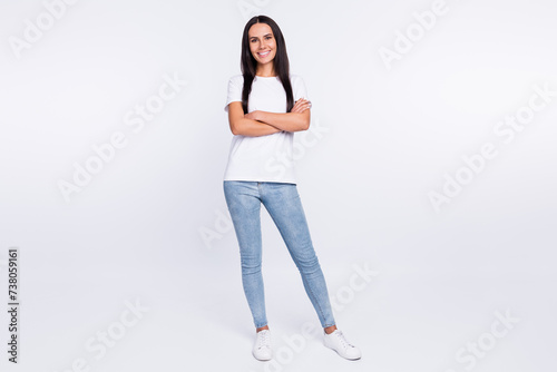 Full length body size photo smiling girl with folded hands in casual clothes isolated on white color background