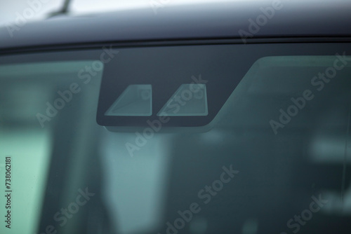 Video recorder on the windshield of the car. Driving Assistants photo