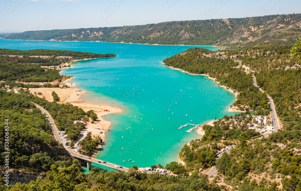 The Verdon Gorge and lake of Sainte Croix du Verdon in the Verdon Natural Regional Park, France panoramic view with kayaks and boats. 