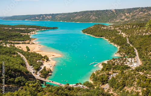 The Verdon Gorge and lake of Sainte Croix du Verdon in the Verdon Natural Regional Park, France panoramic view with kayaks and boats. 