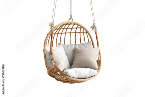 A Comfortable Hanging Chair Adorned With Pillows Invites Relaxation and Comfort. A hanging chair, enhanced with pillows, is designed to provide relaxation and comfort to the user.