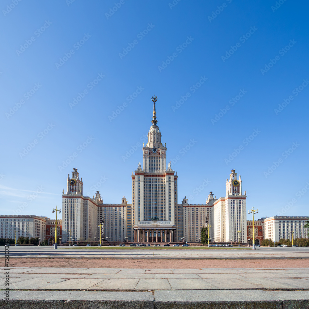 View of the main building of Moscow State University. High-rise building with a spire. Skyscraper in neoclassical style. Architectural dominant and landmark of Moscow. Higher education in Russia. View of the main building of Moscow State University. High-rise building with a spire. Skyscraper in neoclassical style. Architectural dominant and landmark of Moscow. Higher education in Russia.