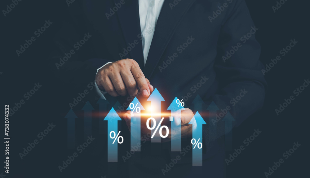 Interest rate and dividend concept, Person using with up arrow with percentage icon. calculating income and return on investment in percentage. income, return, investment, dividend tax. - obrazy, fototapety, plakaty 