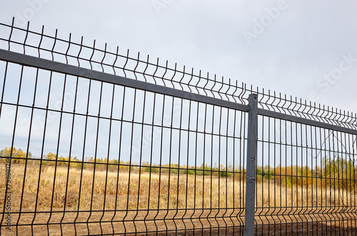 Metal wire fence to protect the territory. Painted wire mesh grille fence panels