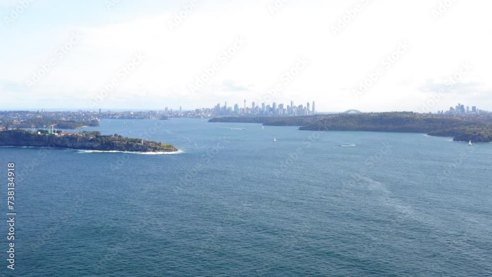 Aerial Panning Beautiful View Of Modern Buildings In City Against Sky, Drone Flying Over Wavy Sea - Benandarah, Australia Aerial Panning Beautiful View Of Modern Buildings In City Against Sky, Drone Flying Over Wavy Sea - Benandarah, Australia