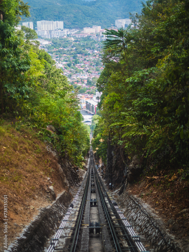 Fototapeta premium Beautiful view from railroad going to Penang Hill, a hill resort comprising a group of peaks on Penang Island. The most iconic transport at Penang Hill