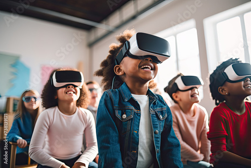 School children wearing VR virtual reality headsets in a classroom photo
