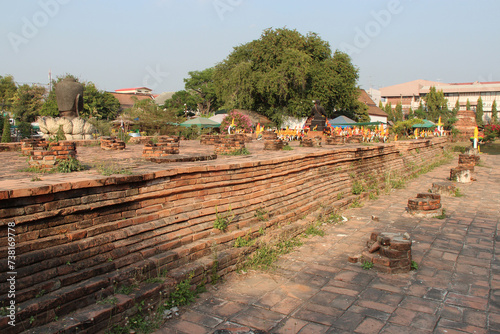 ruined temple (wat thammikarat) in ayutthaya in thailand
