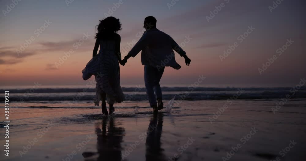 Sunset, holding hands and shadow of couple at beach on vacation, adventure or holiday for romantic date. Love, silhouette and back of people run on tropical weekend trip for valentines day together.