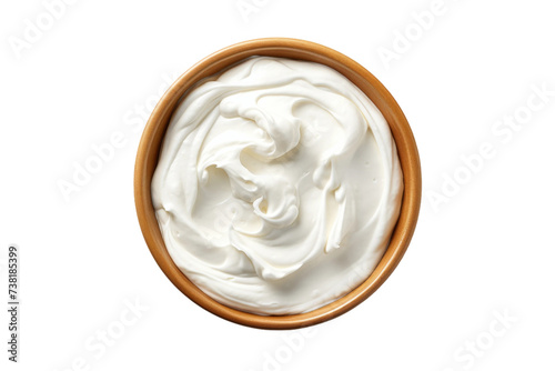 Wooden Bowl Filled With Whipped Cream. A wooden bowl is filled to the brim with fluffy whipped cream.