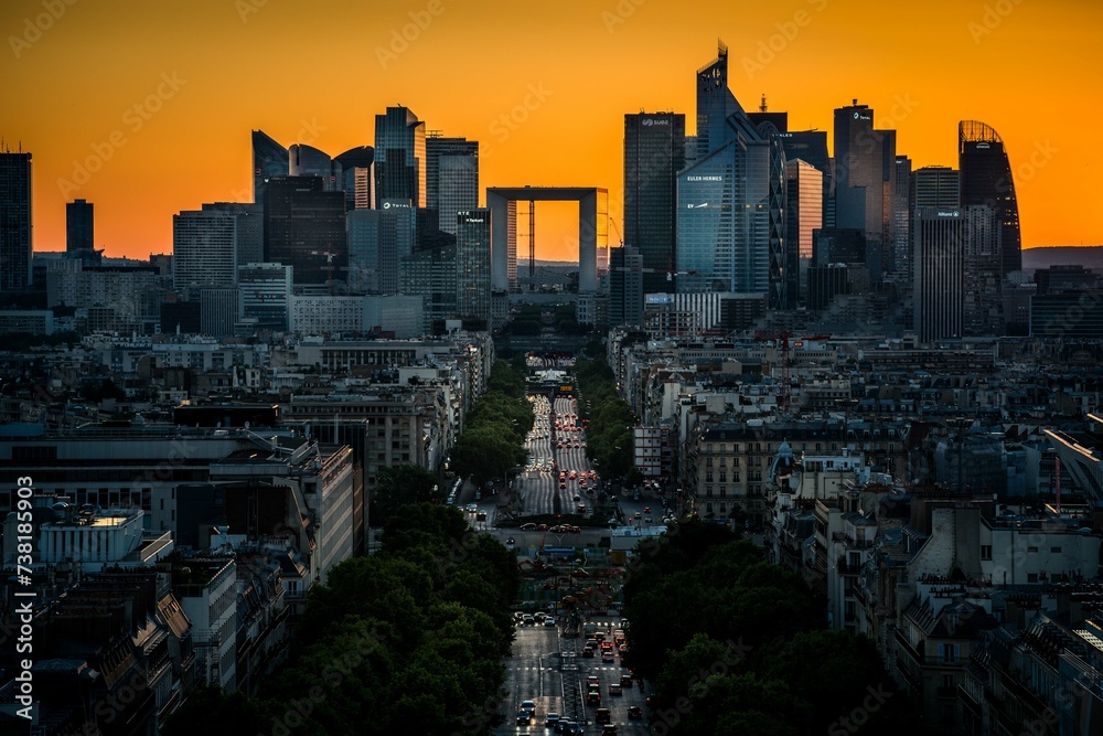 A View of Paris City With Tall Buildings at Sunset