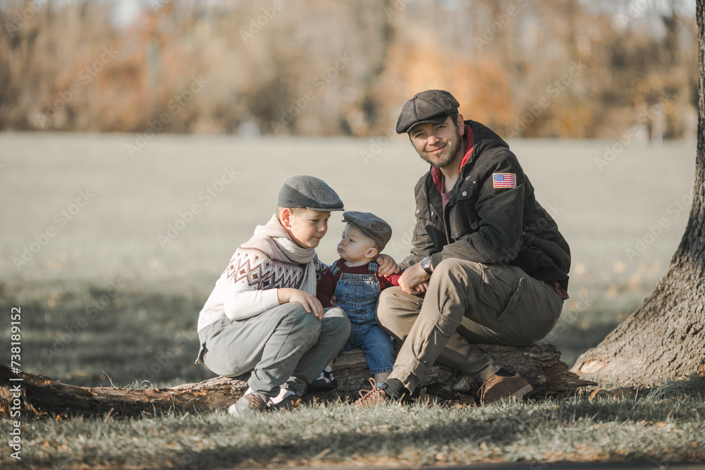 fathers-day-brothers-and-their-dad-enjoying-time-together-in-nature