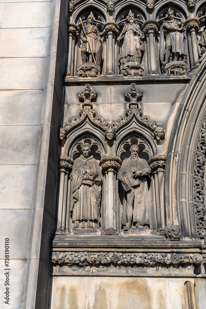 Ornate Carved Stone Figures on the Side of a Cathedral in Edinburgh Scotland