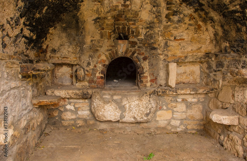 The interior of an 18th century Istrian stone bread oven in Premantura in Istria, Croatia. There were many in the past, but this is the only one remaining in town today photo
