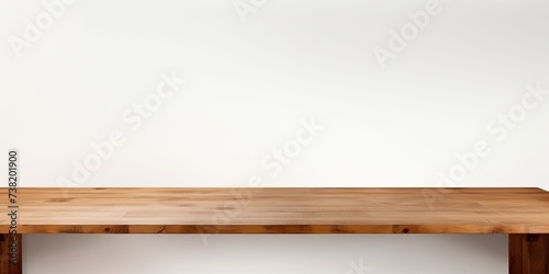 Empty brown table top, shelves in front of a white background.