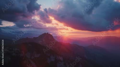Amazing mountain landscape with colorful vivid sunset on the cloudy sky, natural outdoor travel background. Beauty world 