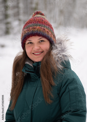 Friendly Smile in the Winter Woods: Woman in a Snowy Scene