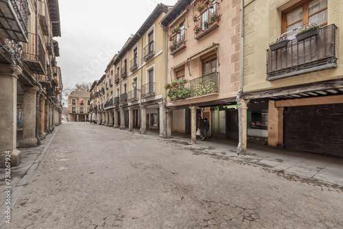 Views of facades of very old and historic houses on the main street of Alcalá de Henares, Madrid