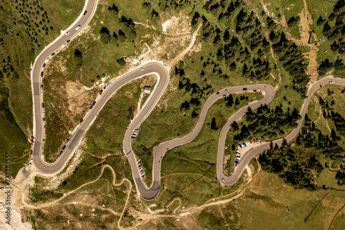 Ariel view of winding mountain road in Italian dolomites