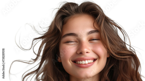 A carefree young woman with tousled hair, captured in a moment of laughter, isolated on a transparent background, showcasing the essence of joy. 