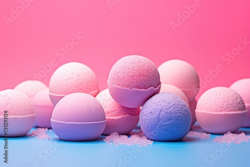 Closeup array of spherical ice cream scoops in shades of pink and blue, scattered artistically against a vibrant dual tone studio background