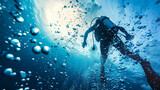 rear view of scuba diver in the ocean