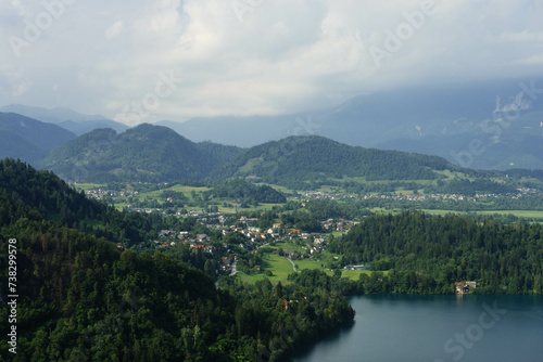 top view of gorgeous clear water blue lake and mountains around in slovenia