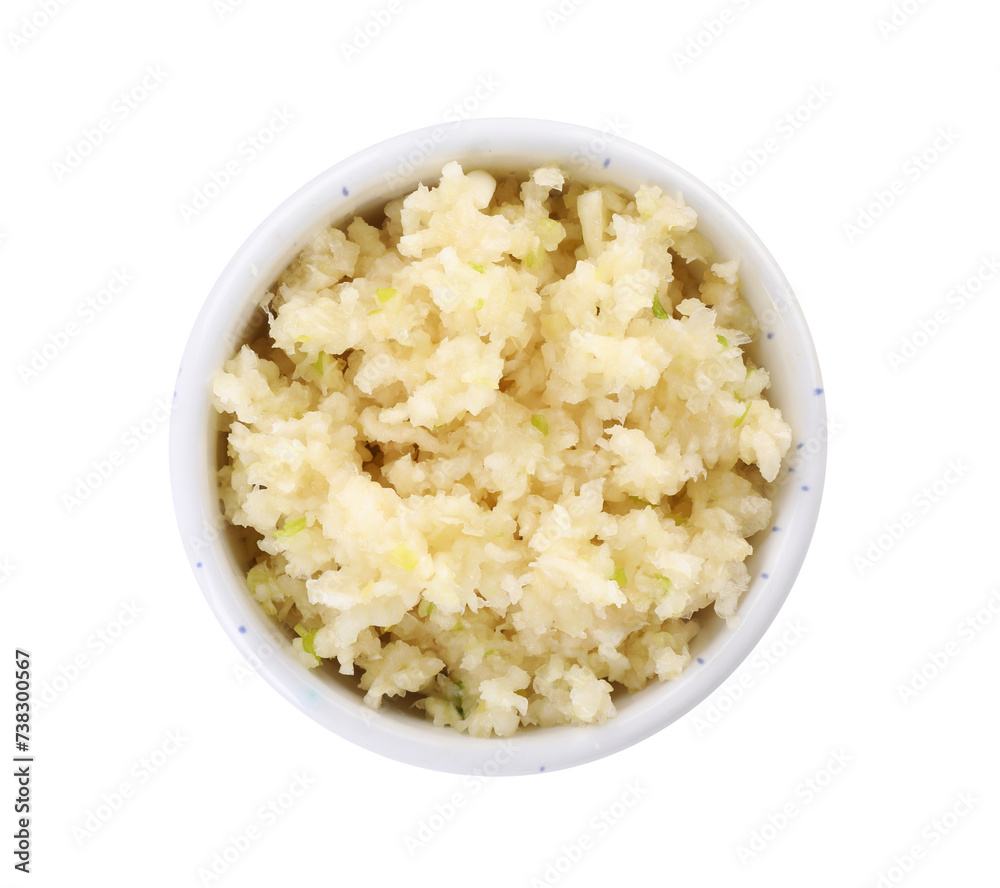 Chopped garlic in bowl isolated on white, top view Chopped garlic in bowl isolated on white, top view