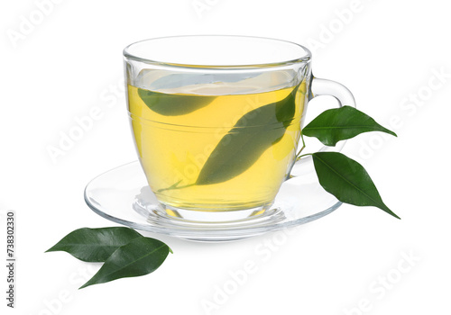 Fresh green tea in glass cup, leaves and saucer isolated on white