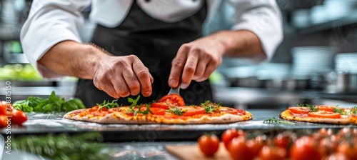 Chef cooking pizza in contemporary restaurant kitchen, adding ingredients with space for text